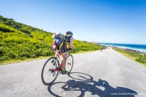 The decent into Sea View is very fast, and certainly not for the fainthearted. Speeds of 80kph can easily be achieved. What you can’t see in this image is the large pod of dolphins beyond the surf line, that appeared to be pacing the photo bike.